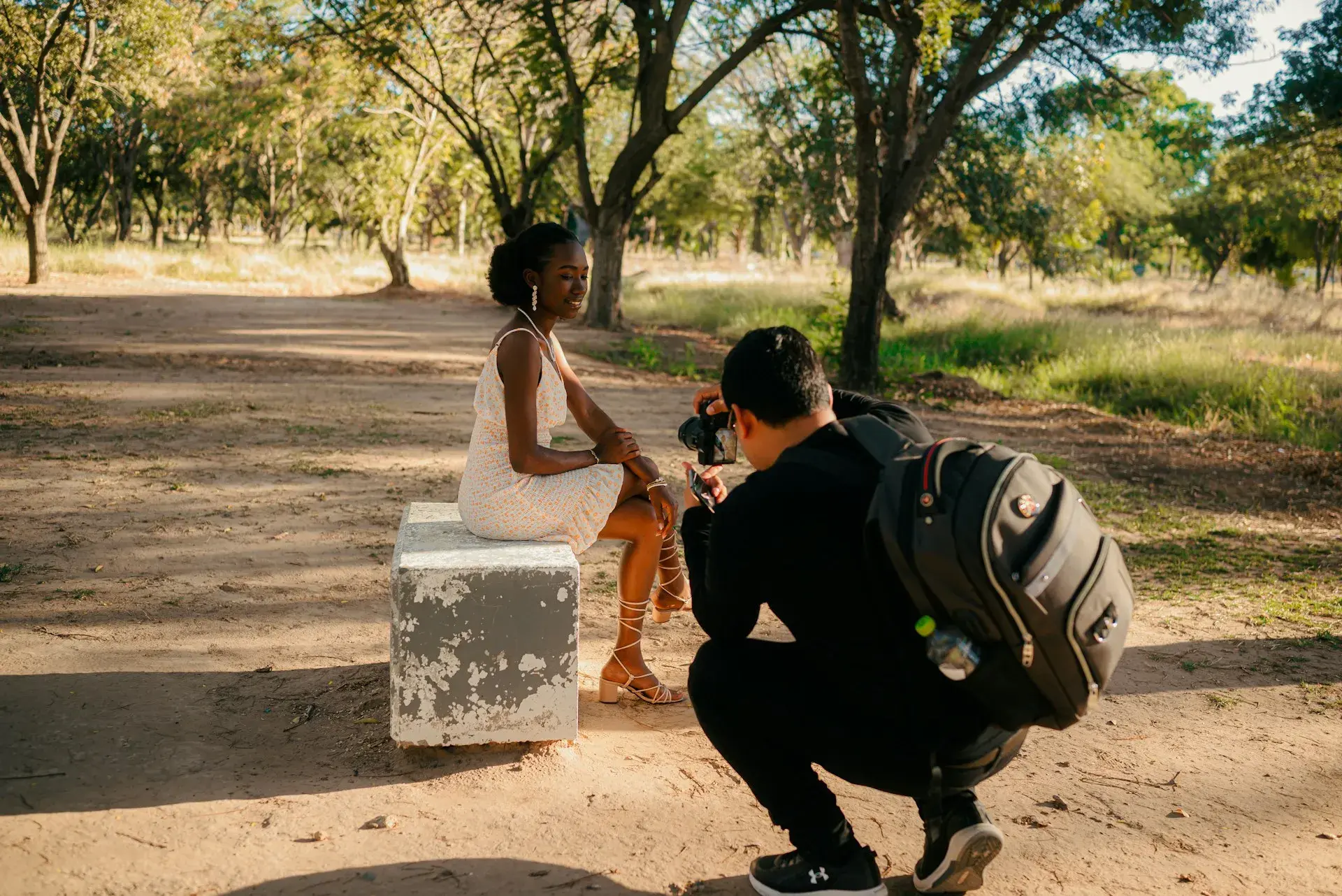 Photographer sharing photos with a happy client